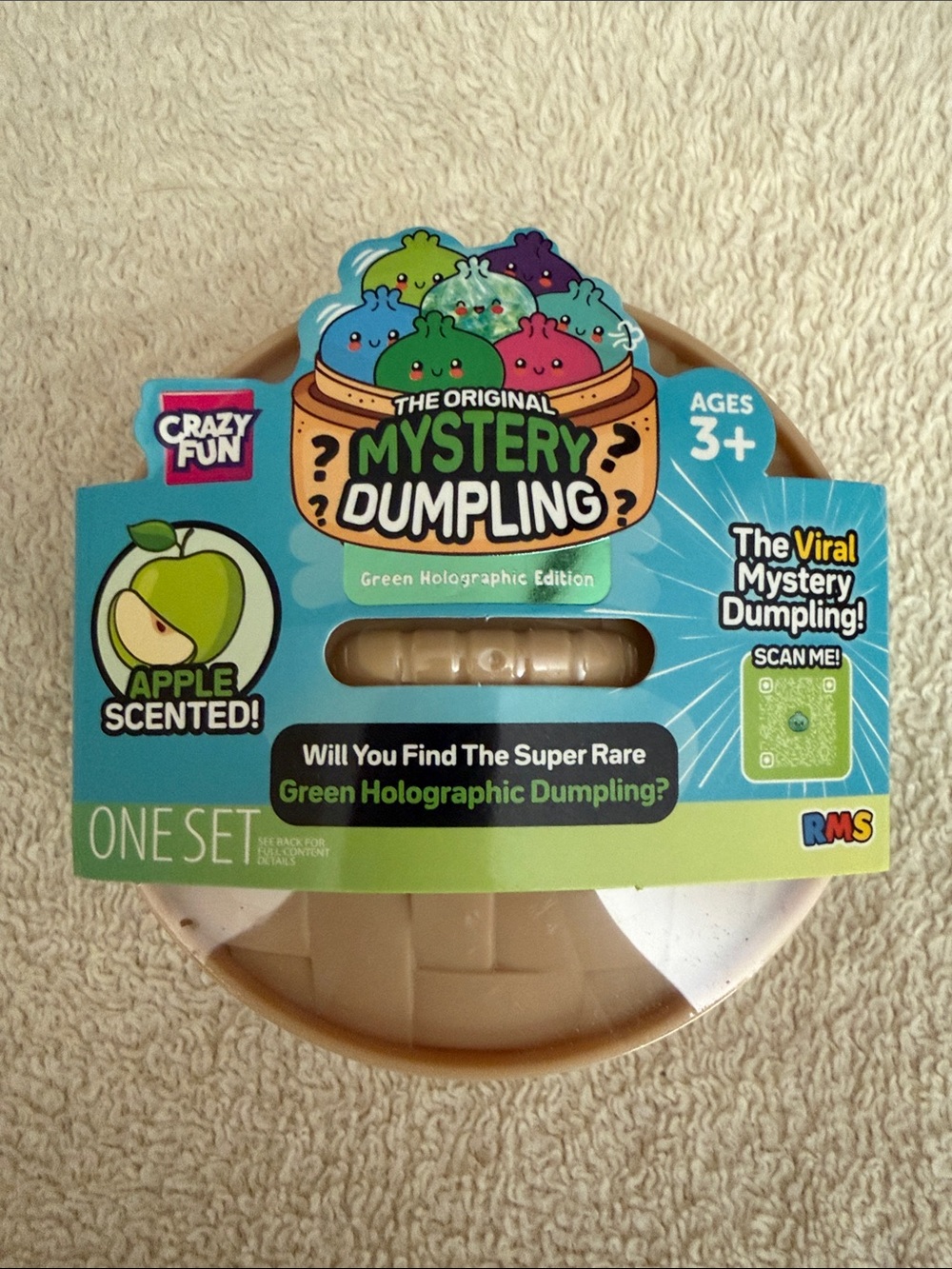 The VIRAL RMS Mystery Dumpling Apple Scented Green Holographic Edition